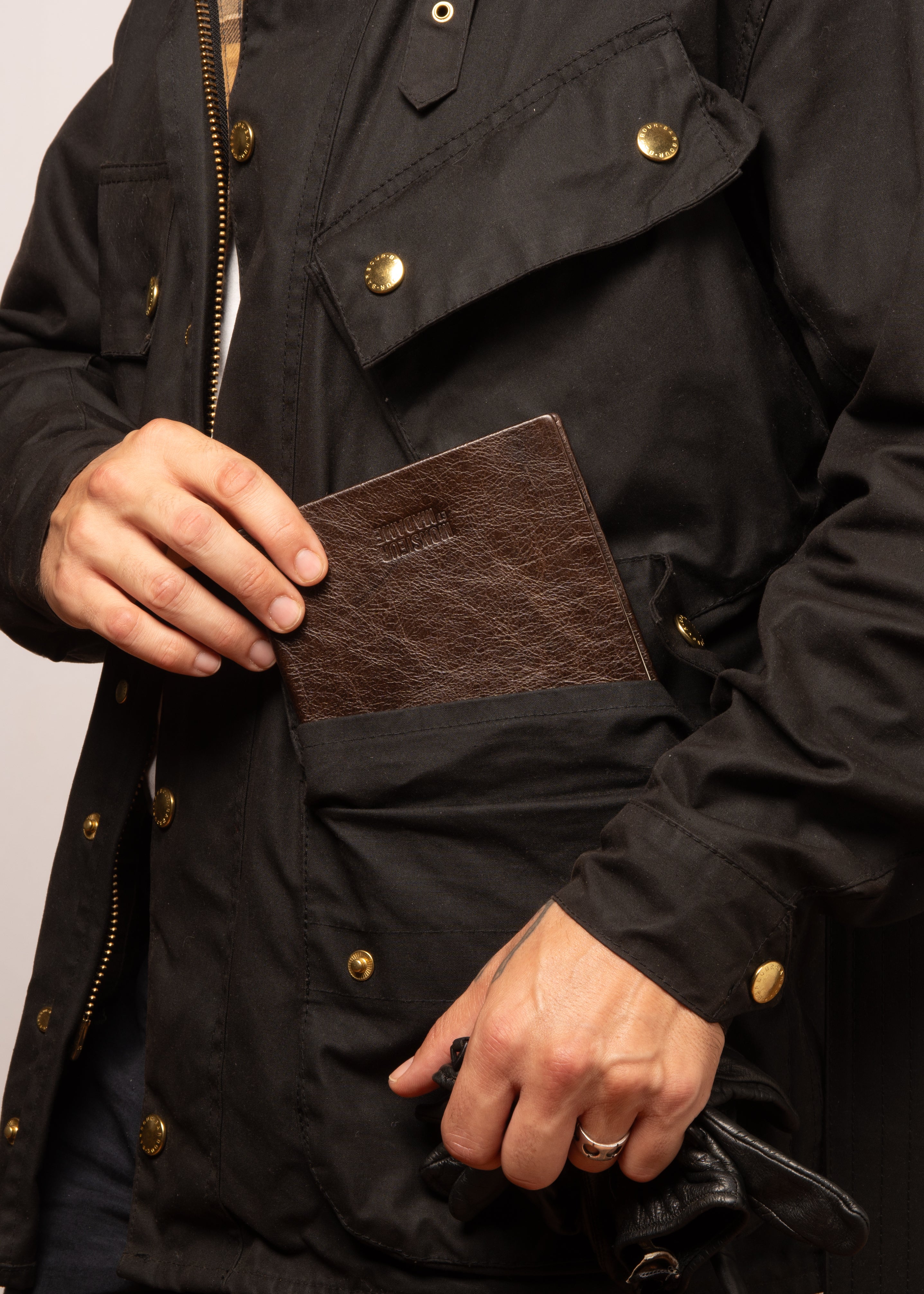 Lifestyle: Tobacco leather notebook carried in jacket pocket.