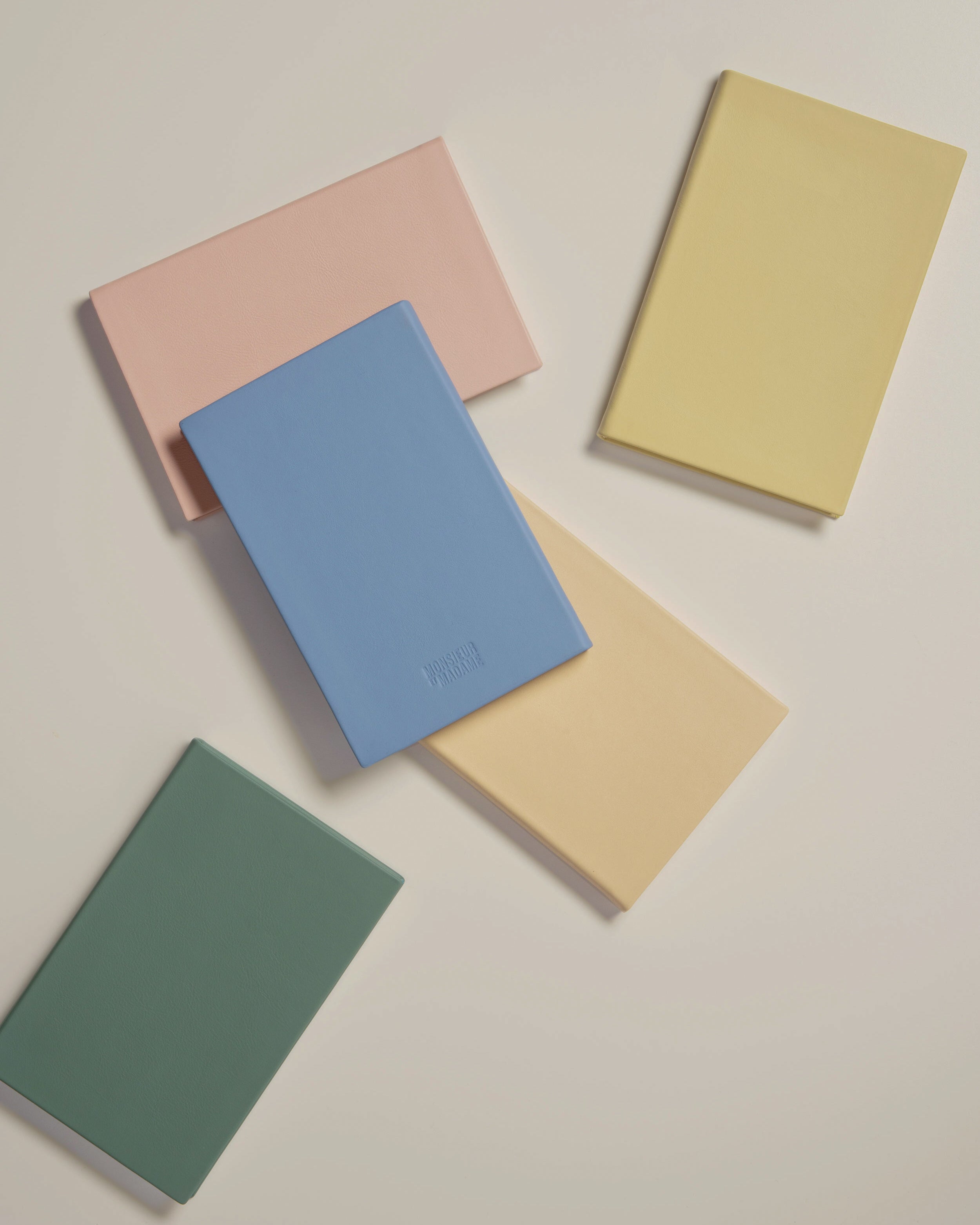 Monsieur et Madame Heritage Collection notebooks, pastel sustainable Italian leather—London luxury stationery for mindful writing.