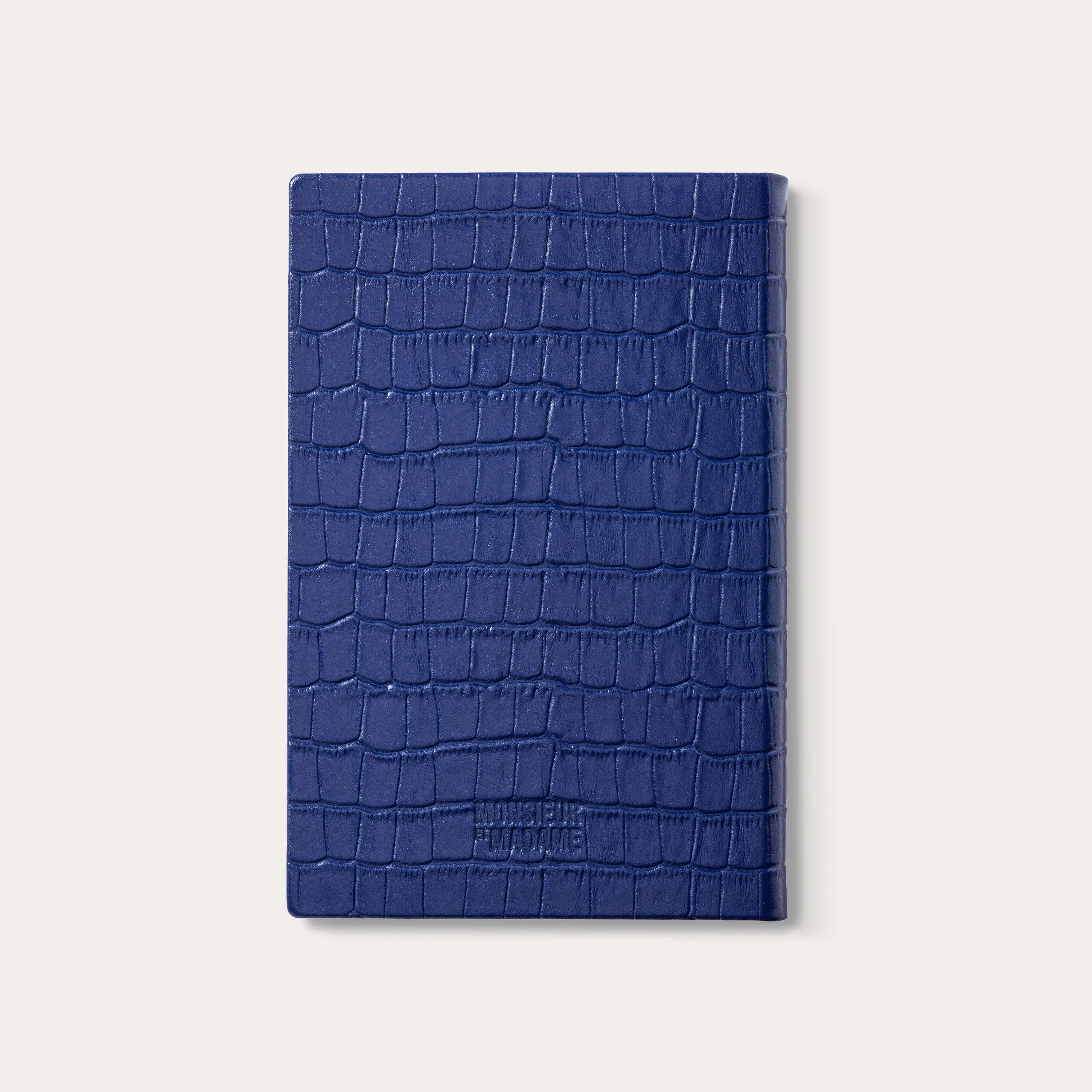 Éclipse luxury croc-embossed blue leather notebook closed back cover.