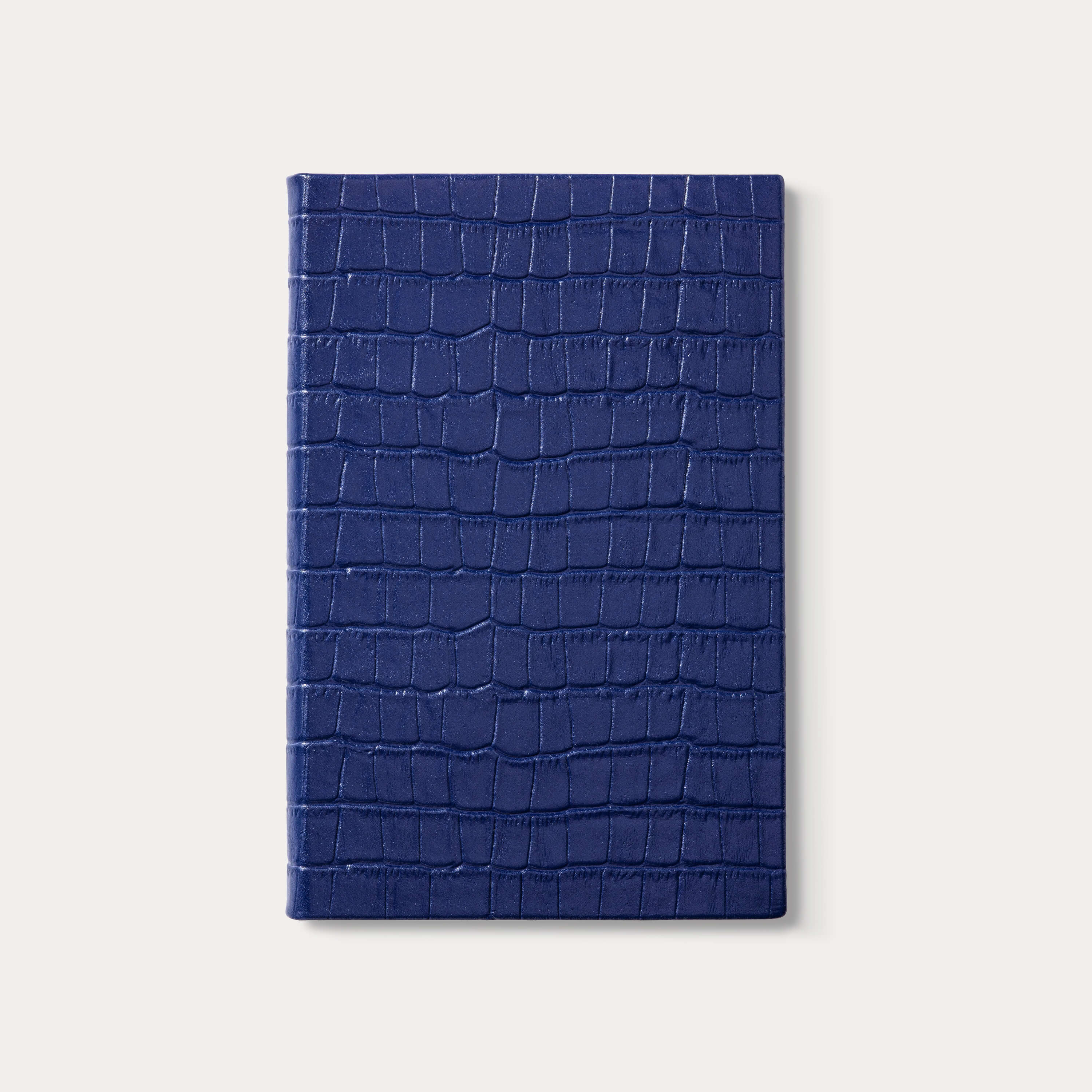 Éclipse luxury croc-embossed blue leather notebook closed front cover.